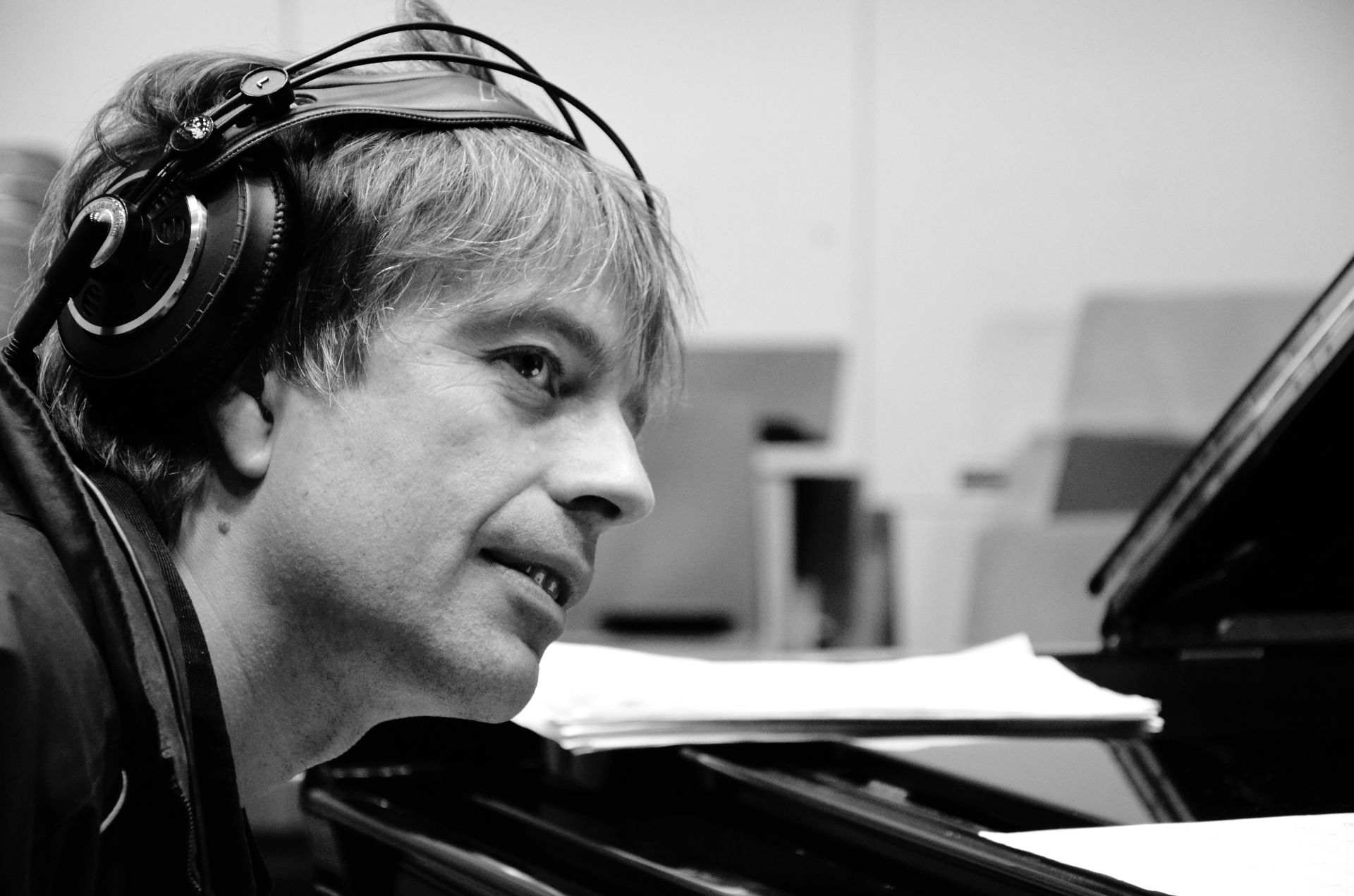 Jan Lundgren at the piano wearing headphones during recording of I Love Jan Lundgren Trio, Studio 3, Sveriges Radio, May 2012.